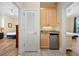 Convenient wet bar situated between two bedroom entrances, equipped with essential amenities at 139 Avian Dr. # 6-201, Pawleys Island, SC 29585