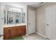 Bathroom vanity with wood cabinet, tile floor and shower at 140 Pixie Dust Ct., Myrtle Beach, SC 29588