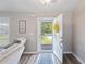Bright entryway with a view to the front yard, featuring a patterned rug and neutral decor at 140 Pixie Dust Ct., Myrtle Beach, SC 29588