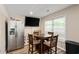 Game room features refrigerator, table and chairs, window and television at 140 Pixie Dust Ct., Myrtle Beach, SC 29588