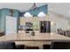Open kitchen showcases an island with bar stool seating, pendant lighting and stainless steel appliances at 140 Pixie Dust Ct., Myrtle Beach, SC 29588