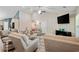 Spacious living room featuring comfortable seating, modern decor, and an electric fireplace at 140 Pixie Dust Ct., Myrtle Beach, SC 29588