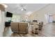 Bright and spacious living room features vaulted ceilings, hardwood floors and a ceiling fan for added comfort at 140 Pixie Dust Ct., Myrtle Beach, SC 29588