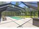 Enclosed screened pool with ample seating and an adjacent shed in the well-maintained backyard at 140 Pixie Dust Ct., Myrtle Beach, SC 29588