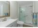 Updated bathroom with modern vanity, toilet, and glass-enclosed shower for a clean and stylish space at 1450 St. George Ln. # E, Myrtle Beach, SC 29588