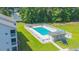 Aerial view of a community pool surrounded by chairs and a fence, perfect for summer relaxation at 1450 St. George Ln. # E, Myrtle Beach, SC 29588