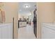 Hallway view into kitchen and dining area from the laundry room at 155 Palmetto Green Dr., Longs, SC 29568