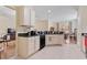 Well-lit kitchen featuring white cabinets, black countertops, and stainless steel appliances at 155 Palmetto Green Dr., Longs, SC 29568