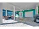 Open garage featuring a golf cart, providing convenient storage and recreational space at 1733 24Th Ave. N, North Myrtle Beach, SC 29582