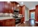 Charming kitchen with updated stainless appliances, granite counters and hardwood flooring at 1733 24Th Ave. N, North Myrtle Beach, SC 29582