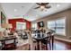 Open-concept living and dining area features hardwood floors and a ceiling fan for a cozy feel at 1733 24Th Ave. N, North Myrtle Beach, SC 29582