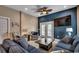 Inviting living room with ample seating, a mounted TV, and beach-themed decor at 1733 24Th Ave. N, North Myrtle Beach, SC 29582