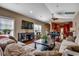 Bright living area showcases large windows, hardwood floors, and comfortable seating at 1733 24Th Ave. N, North Myrtle Beach, SC 29582