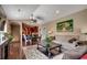 Inviting living room features hardwood floors, neutral paint, and a view into the kitchen at 1733 24Th Ave. N, North Myrtle Beach, SC 29582