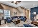 Spacious living area with a high ceiling, comfortable furniture, and natural light at 1733 24Th Ave. N, North Myrtle Beach, SC 29582