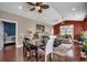 Open living space with a dining area, comfortable seating, and access to the balcony at 1733 24Th Ave. N, North Myrtle Beach, SC 29582