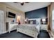 Main bedroom with a plush bed, neutral tones, and an en-suite bathroom at 1733 24Th Ave. N, North Myrtle Beach, SC 29582