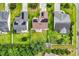 Aerial view of a neighborhood home with solar panels and a fenced yard at 180 Weeping Willow Dr., Myrtle Beach, SC 29579