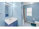 Bright bathroom with a vanity, mirror, bathtub, and modern fixtures at 180 Weeping Willow Dr., Myrtle Beach, SC 29579