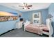 Comfortable bedroom with a desk, a tv and natural light at 180 Weeping Willow Dr., Myrtle Beach, SC 29579