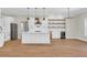 Modern kitchen with white cabinets, stainless steel appliances, and a large island at 2192 Eastwoods Dr., Conway, SC 29526