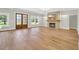 Spacious living room with fireplace, wooden floors, and ample natural light at 2192 Eastwoods Dr., Conway, SC 29526