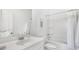 Bright bathroom with white vanity, large mirror, and shower-tub combination at 222 Atlantic Breeze St., Myrtle Beach, SC 29572