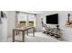 Stylish home office with shiplap walls, natural light, and entertainment setup at 222 Atlantic Breeze St., Myrtle Beach, SC 29572
