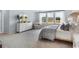 Calming main bedroom showcasing large windows with scenic views at 222 Atlantic Breeze St., Myrtle Beach, SC 29572