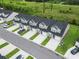 Aerial view of townhome community with well-maintained landscaping, driveways, and garages at 244 Jasper Overlook Way # 244, Myrtle Beach, SC 29588