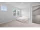 Minimalist bedroom with natural light highlighting its clean, uncluttered space at 244 Jasper Overlook Way # 244, Myrtle Beach, SC 29588