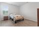 Bedroom featuring a bed, a window and a bedside table at 244 Jasper Overlook Way # 244, Myrtle Beach, SC 29588