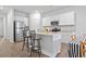 Open kitchen with granite countertops, stainless steel appliances, and a breakfast bar at 244 Jasper Overlook Way # 244, Myrtle Beach, SC 29588