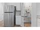 Bright kitchen featuring stainless steel appliances and a pantry with wire shelving at 244 Jasper Overlook Way # 244, Myrtle Beach, SC 29588