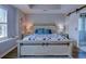 Bedroom with sliding door to bathroom, hard floors, nautical decor, and shuttered window at 2479 Burning Tree Ln., Little River, SC 29566