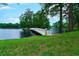 Scenic bridge over the pond and the lush landscape that surrounds it at 2479 Burning Tree Ln., Little River, SC 29566