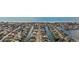 Waterfront homes with boat docks line a canal leading to the ocean at 302 46Th Ave. N, North Myrtle Beach, SC 29582