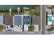 Birds eye view of home and neighborhood showcases the roof, driveway, and surrounding neighborhood at 302 46Th Ave. N, North Myrtle Beach, SC 29582