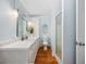 This shared bathroom includes modern lighting fixtures and walk in shower at 302 46Th Ave. N, North Myrtle Beach, SC 29582