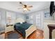 A bedroom with blue decor and plenty of natural light at 302 46Th Ave. N, North Myrtle Beach, SC 29582