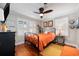 This bedroom offers hardwood floors and bright colors at 302 46Th Ave. N, North Myrtle Beach, SC 29582