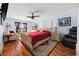 The bedroom offers a ceiling fan and access to the balcony at 302 46Th Ave. N, North Myrtle Beach, SC 29582