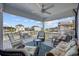 Inviting covered deck with comfortable seating and neighborhood views at 302 46Th Ave. N, North Myrtle Beach, SC 29582
