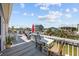 Spacious deck offering scenic views of the surrounding waterway and neighborhood at 302 46Th Ave. N, North Myrtle Beach, SC 29582