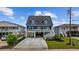 Charming raised beach house with a spacious driveway and well-kept lawn at 302 46Th Ave. N, North Myrtle Beach, SC 29582
