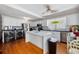 Bright kitchen featuring a marble island, stainless steel appliances, and adjacent washer and dryer at 302 46Th Ave. N, North Myrtle Beach, SC 29582