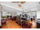 Open-concept living and dining area featuring hardwood floors and modern decor at 302 46Th Ave. N, North Myrtle Beach, SC 29582