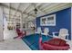 The patio is located underneath the home and features a blue rug at 302 46Th Ave. N, North Myrtle Beach, SC 29582