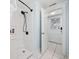 The shower has black trim and a built in soap shelf at 302 46Th Ave. N, North Myrtle Beach, SC 29582