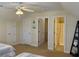 Comfortable bedroom with two beds, complemented by convenient ensuite bathroom access at 312 Shelly Bay Ct., Surfside Beach, SC 29575